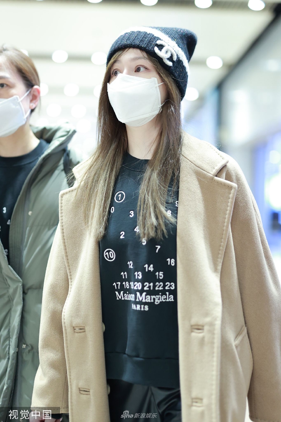 组图:王心凌元旦现身机场 驼色大衣 冷帽保暖又舒适_高清图集_新浪网