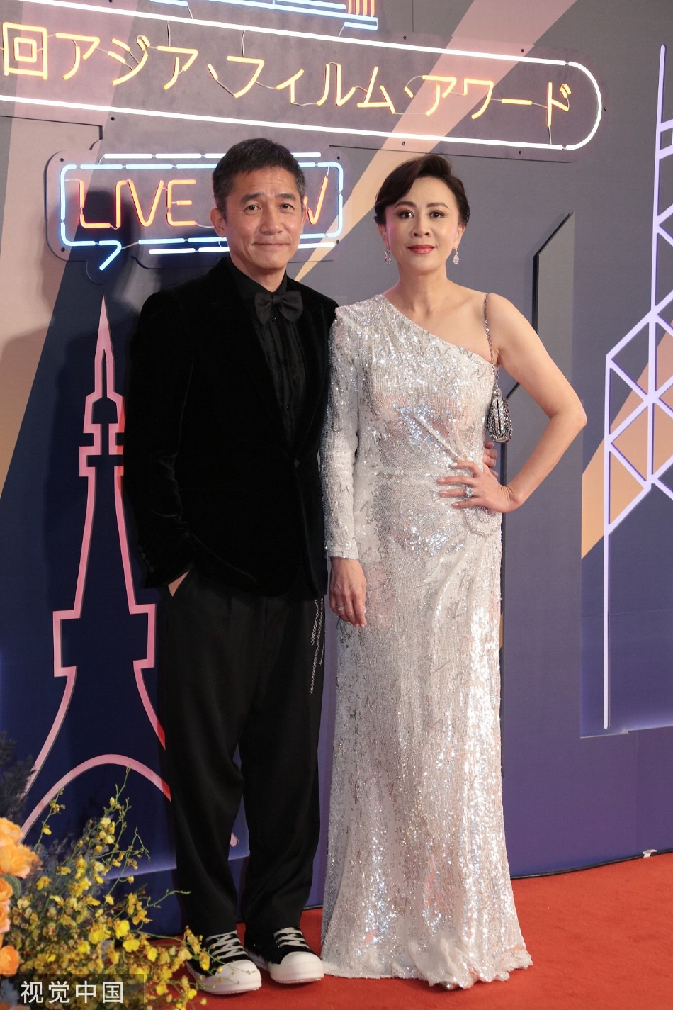 第16届亚洲电影大奖红毯举行 梁朝伟刘嘉玲牵手亮相
