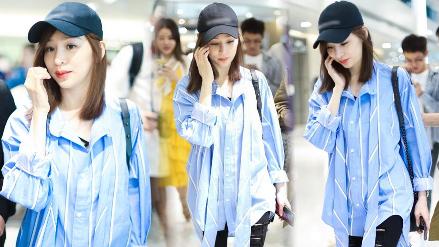 王心凌单手捂脸摆“牙痛”pose 皮肤紧致白皙