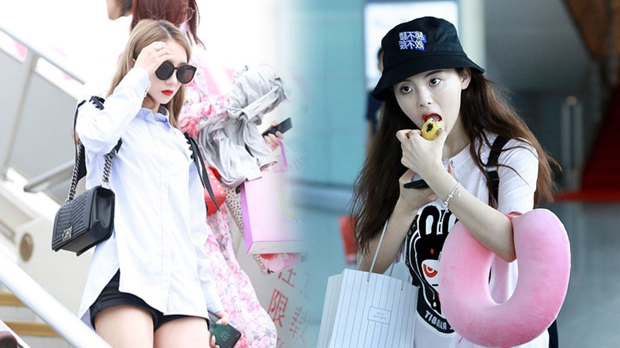 火箭少女机场被围堵 孟美岐气场足杨超越边走边吃