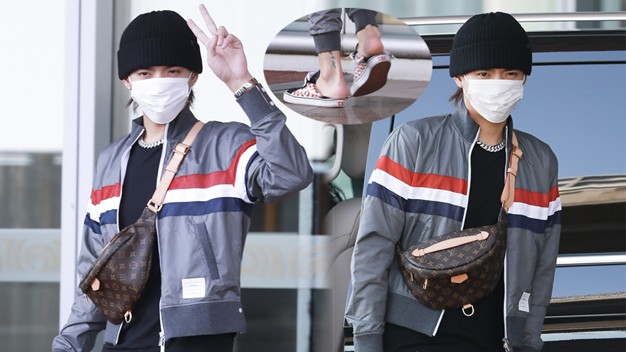 吴亦凡运动潮装亮相对镜比V 帆布鞋当拖鞋穿显不羁