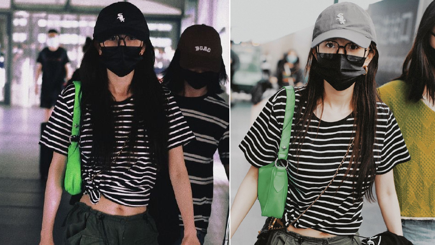 杨幂戴黑框眼镜现身机场 遇路人插队出言制止获好评