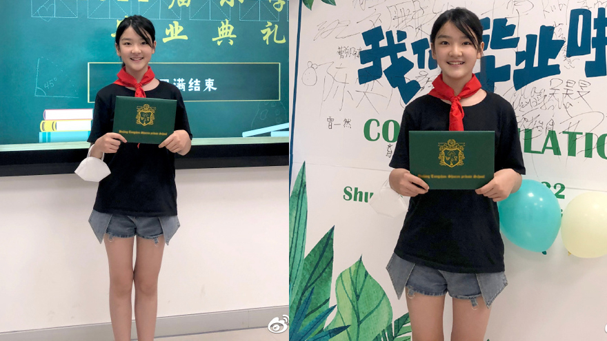 王圣迪小学毕业晒照留念 手拿证书对镜头开心微笑