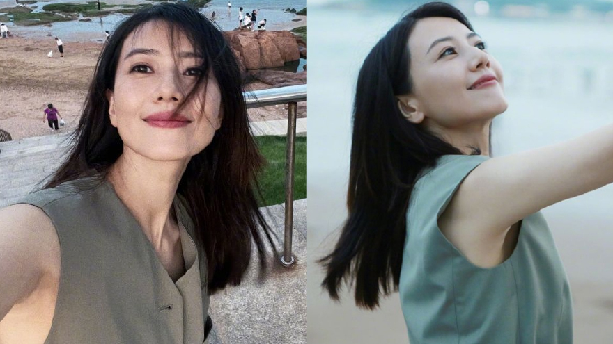 自拍他拍都好美!高圆圆晒海边随拍 穿无袖上衣侧颜精致