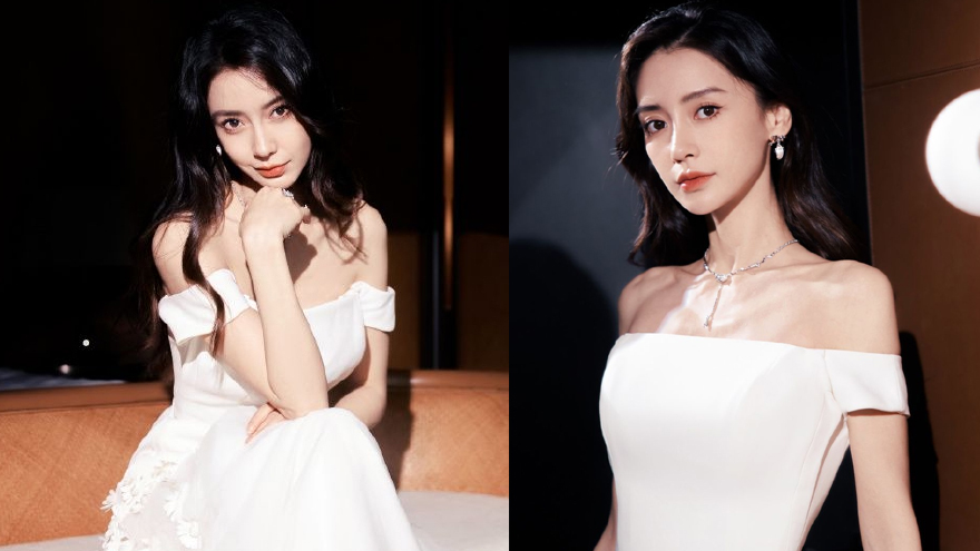 Angelababy穿白色抹胸裙优雅 红唇搭波浪卷发仙气十足