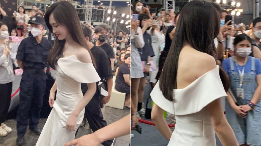 唐嫣获粉丝簇拥人气旺 白色露肩裙装优雅甜美
