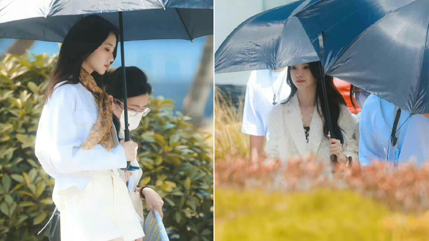 刘浩存《脱轨》新路透 身穿白色西装短裤撑伞入片场