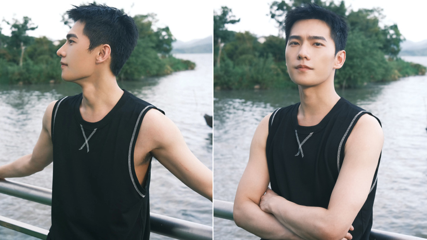 杨洋穿黑色无袖背心秀手臂肌肉 侧颜线条流畅帅气有型