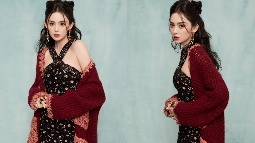 古力娜扎着金色刺绣裙衬托雪白肌肤 眼神深邃气质迷人