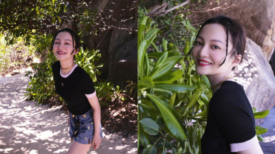 张韶涵海边小岛沐浴阳光 晒照身材纤细笑容温暖灿烂