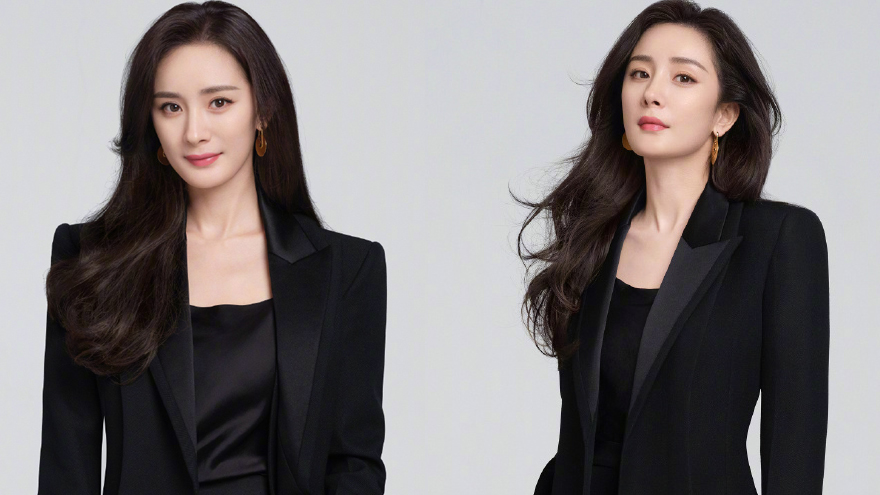 杨幂一袭黑色西装套装简约优雅 波浪卷发显温柔知性