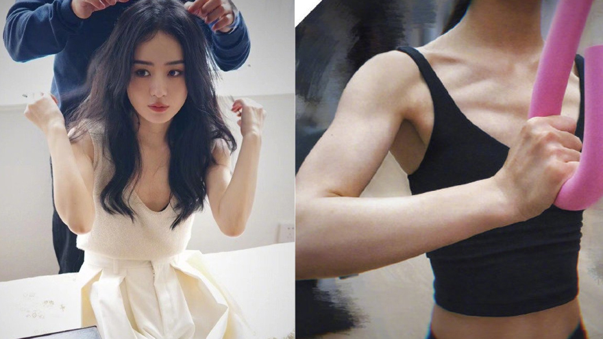 赵丽颖长卷发披肩清纯甜美 着无袖白裙手臂肌肉线条抢镜