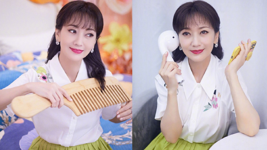 赵雅芝白衬衣配绿裙温婉素雅 手持大号美妆工具显脸小