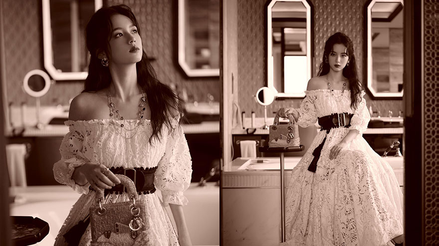 周也穿白色抹胸裙大秀锁骨 长发垂肩侧颜精致气质佳