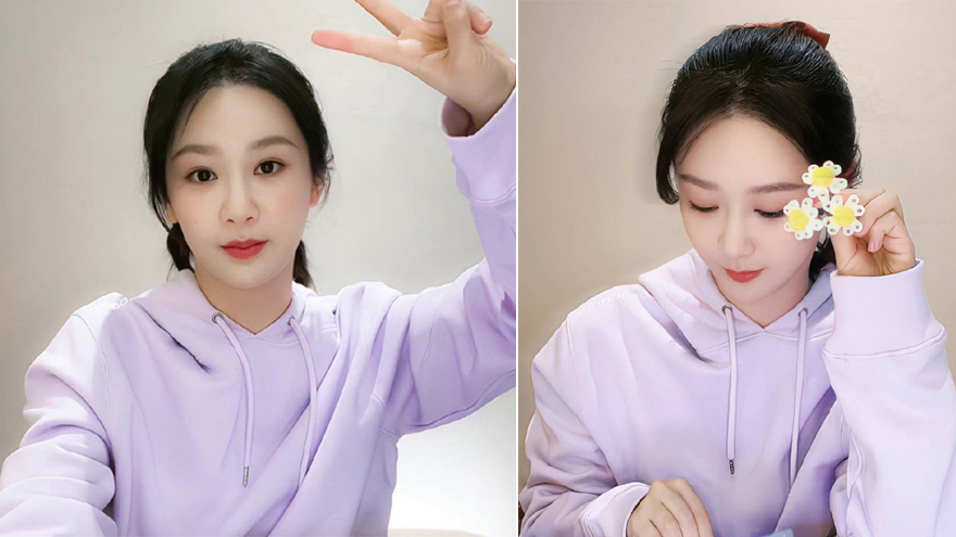 杨紫直播生图俏皮可爱 手拿鲜花对镜头比耶元气满满