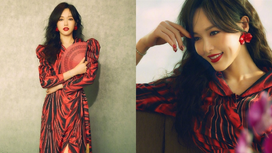 唐嫣晒兔年写真温婉大气 着红黑开叉长裙露灿笑气质佳