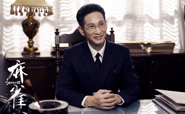 李默群（王劲松饰演）