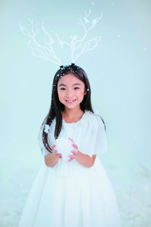 8岁的吴雨锜希望用音乐去帮助更多人。