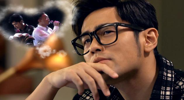 周杰伦格子衫显露文艺气质