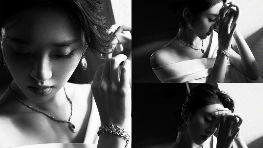 唐艺昕晒黑白大片侧颜精致 一字肩礼服锁骨好优越