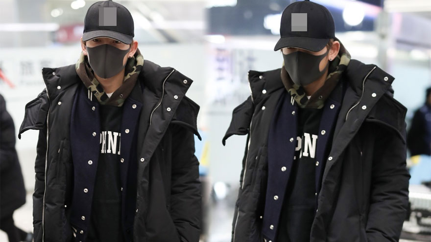 陈翔口罩遮面现身机场 里三层外三层保暖出行