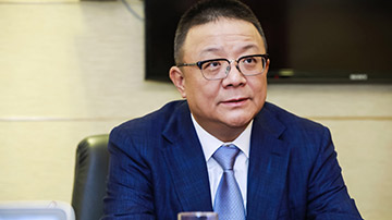周忻：再上市依然是“服务生”