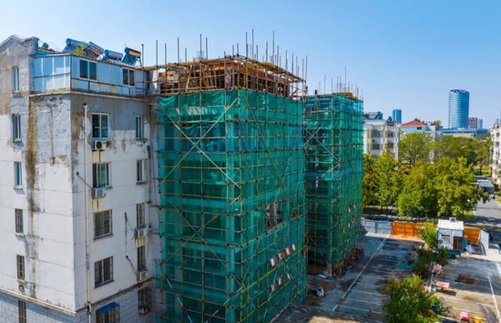  △江苏泗洪：加快改进老旧小区。（云尔图）中新社发 张连华 摄