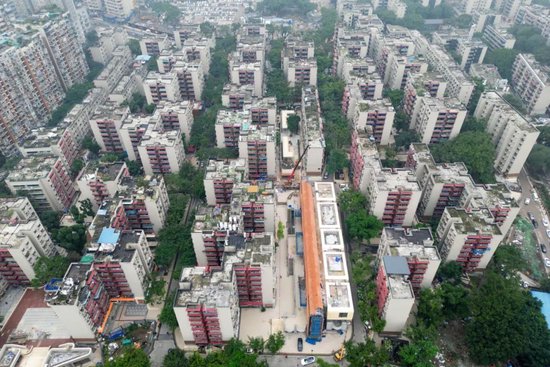 △2024年11月14日，重庆市民主村二期城市更新名目投入扫尾阶段。（云尔图）中新社发 赵俊超 摄