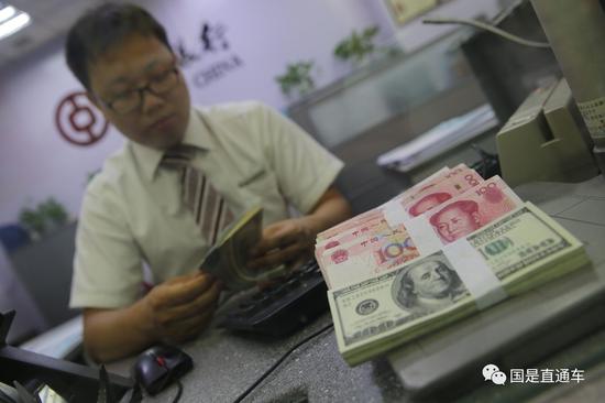 人民币对美元汇率中间价九连升 涨势能否持续?