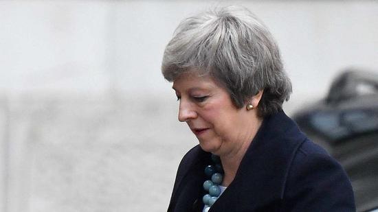 英国议会下院14日投票通过一项要求推迟“脱欧”的政府动议 英国议会下院14日投票通过一项要求推迟“脱欧”的政府动议
