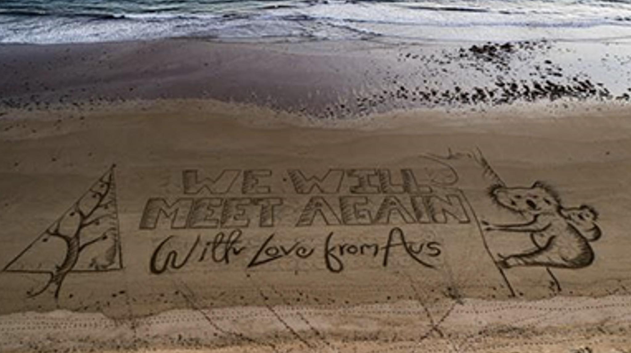 澳大利亚沙滩现致英国人的巨型圣诞贺卡：“我们将再会”