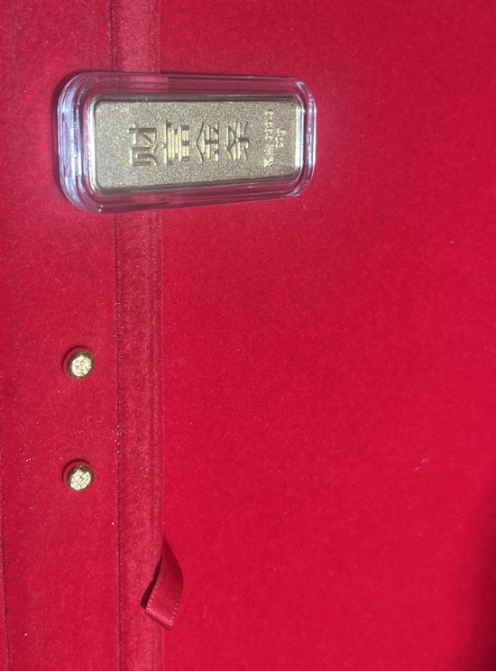 (金豆豆与分量较轻的金条成为门槛较低的投资品 摄/何柳颖)