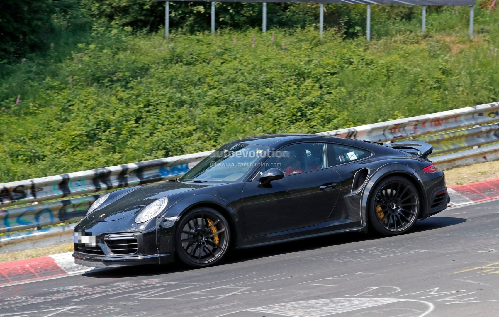 next-generation-porsche-911-turbo-test-mule-hits-nurburgring-a-widebody-monster_5.jpg