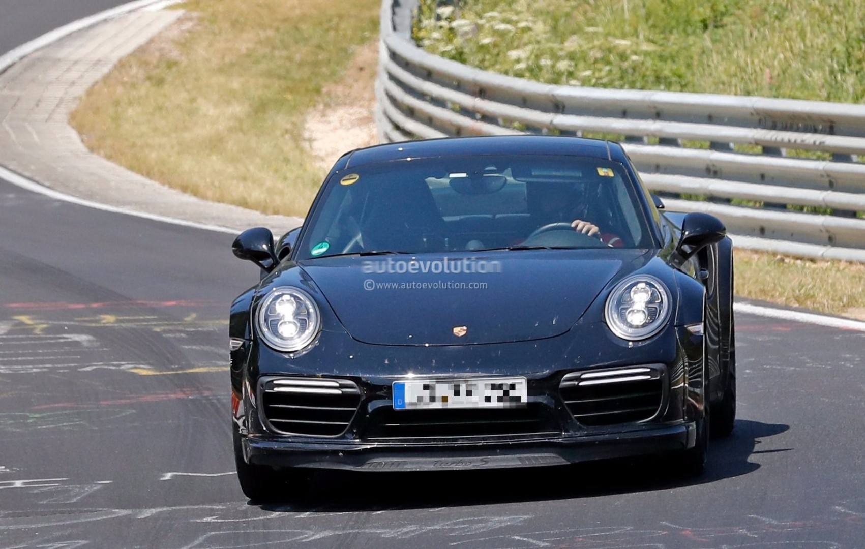 next-generation-porsche-911-turbo-test-mule-hits-nurburgring-a-widebody-monster_1.jpg