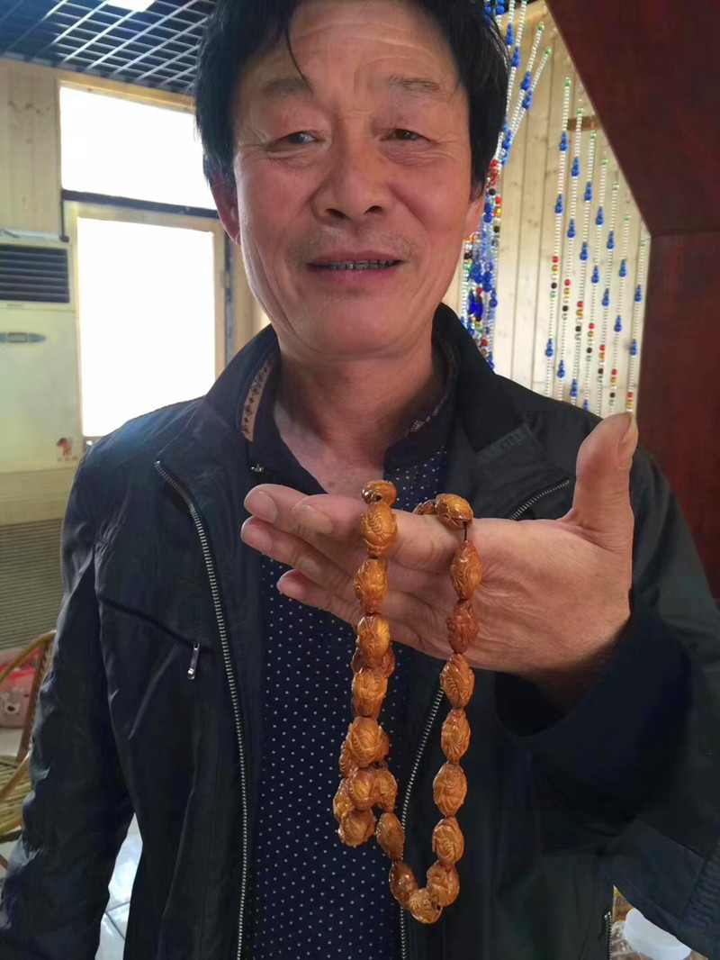 苏州橄榄核雕十大名家之-谢才元