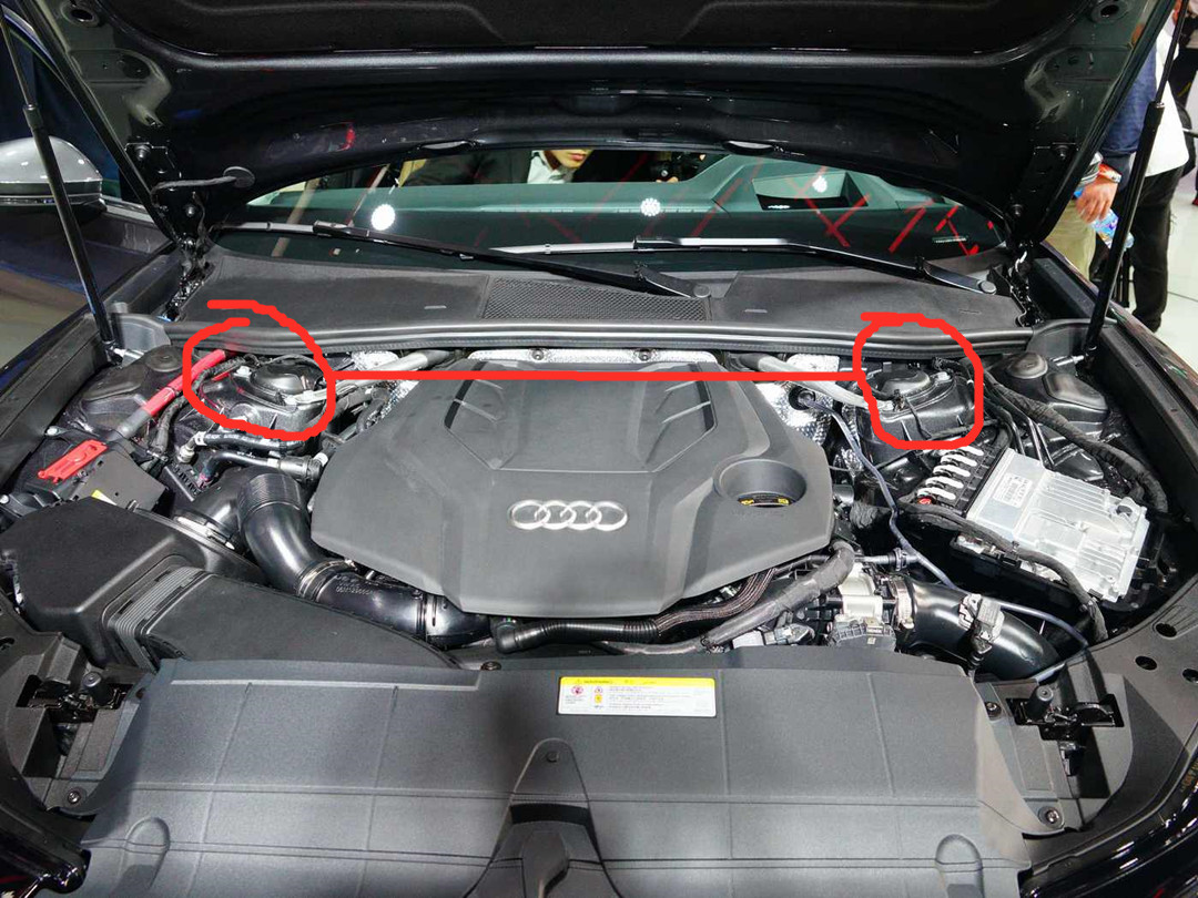 奥迪a6 3.0t机舱,引擎大部分位于前轴之前(看悬挂塔顶)宝马5系3.