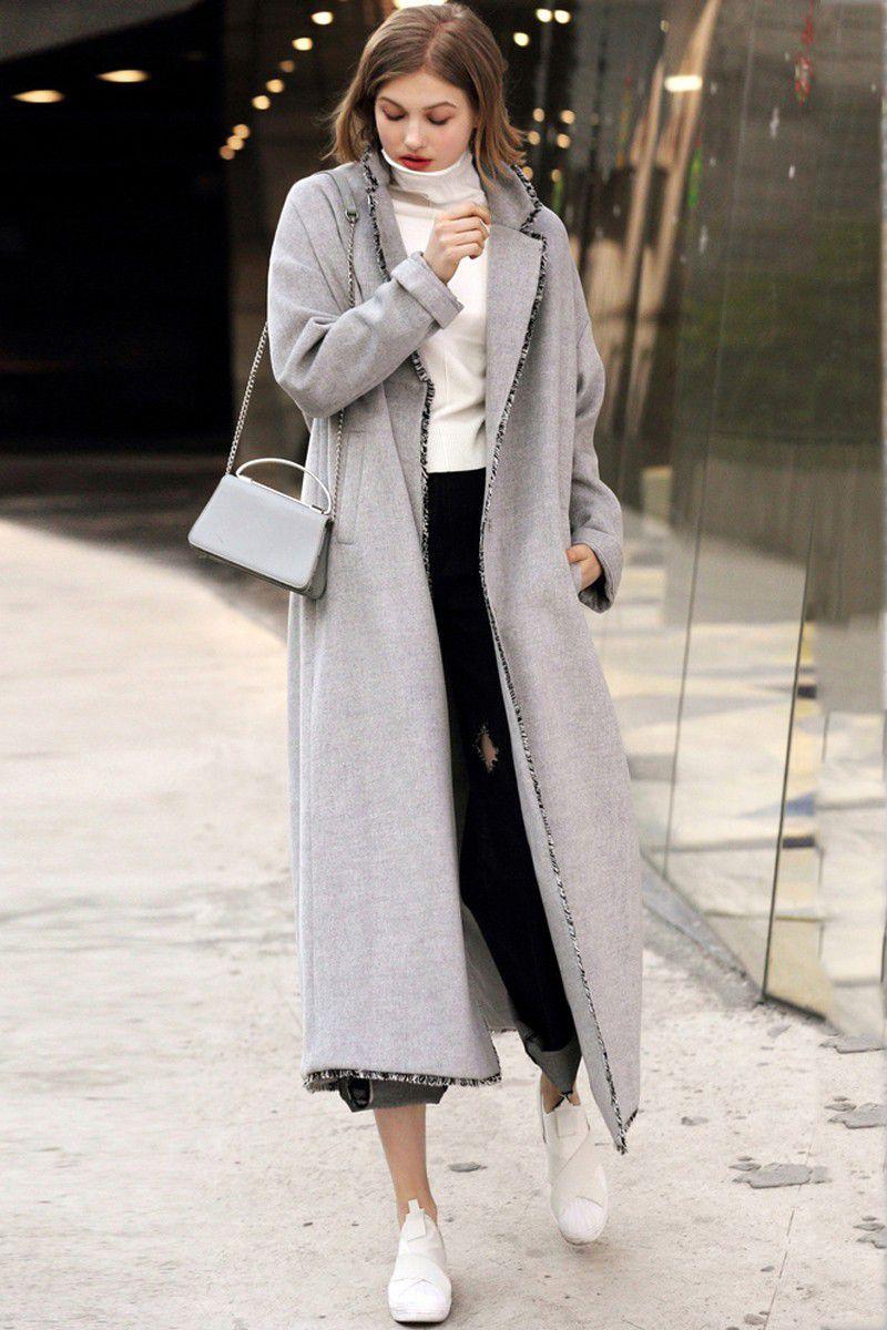 质感,细腻的手工缝制,同时精选优质的羊毛面料,融合了简约时尚的气质