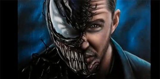 小哥哥画的是毒液半脸状态,一半是毒液的脸,一半是男主的脸,当看到男