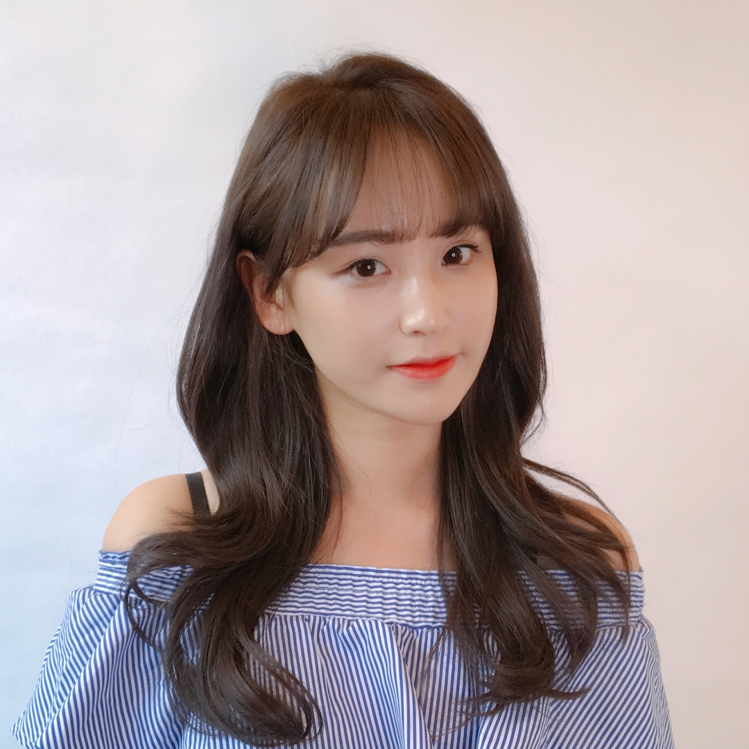 美出新高度微卷的发型让你美翻天