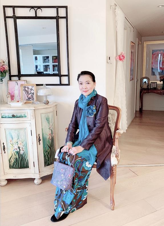 沈丹萍虽已年满59岁,慈匀幻赖梅欠餐阉,年龄对她