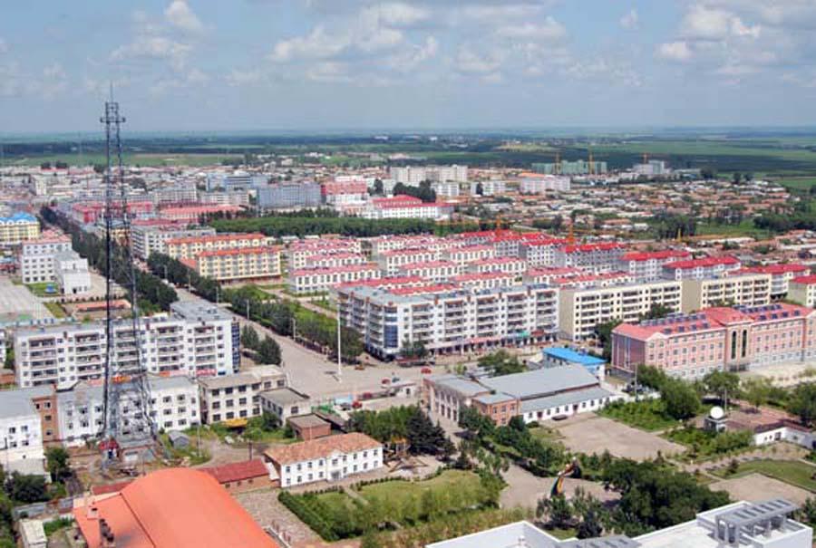 黑龙江黑河北安市一个大镇, 和克东县接壤, 是全国重点镇|大豆|赵光镇