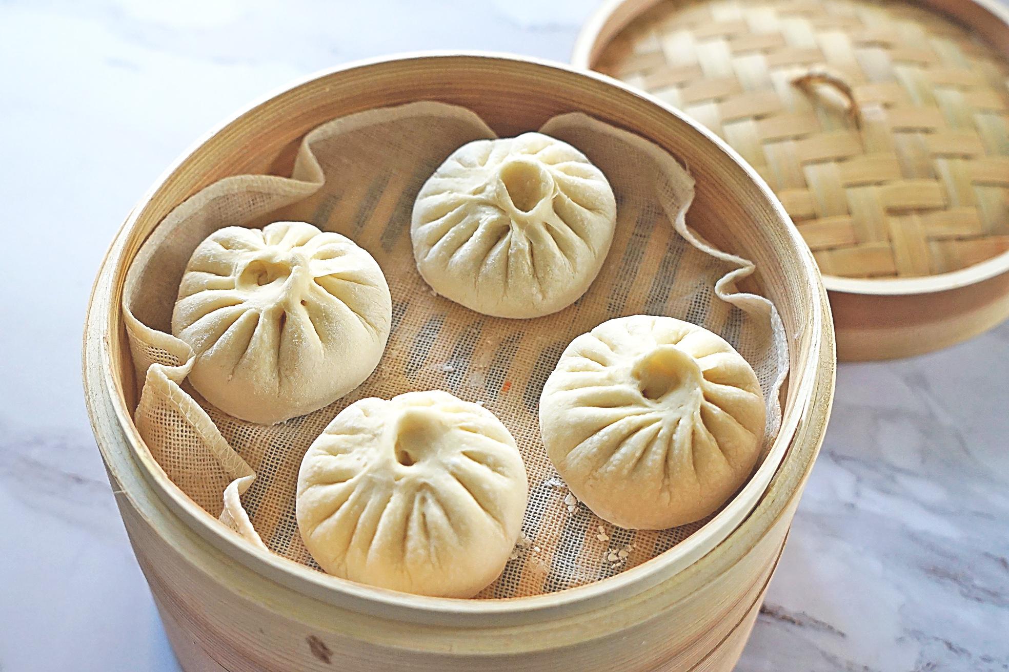 婆婆没想到儿媳第一次包包子,就比她包了几十年的还漂亮