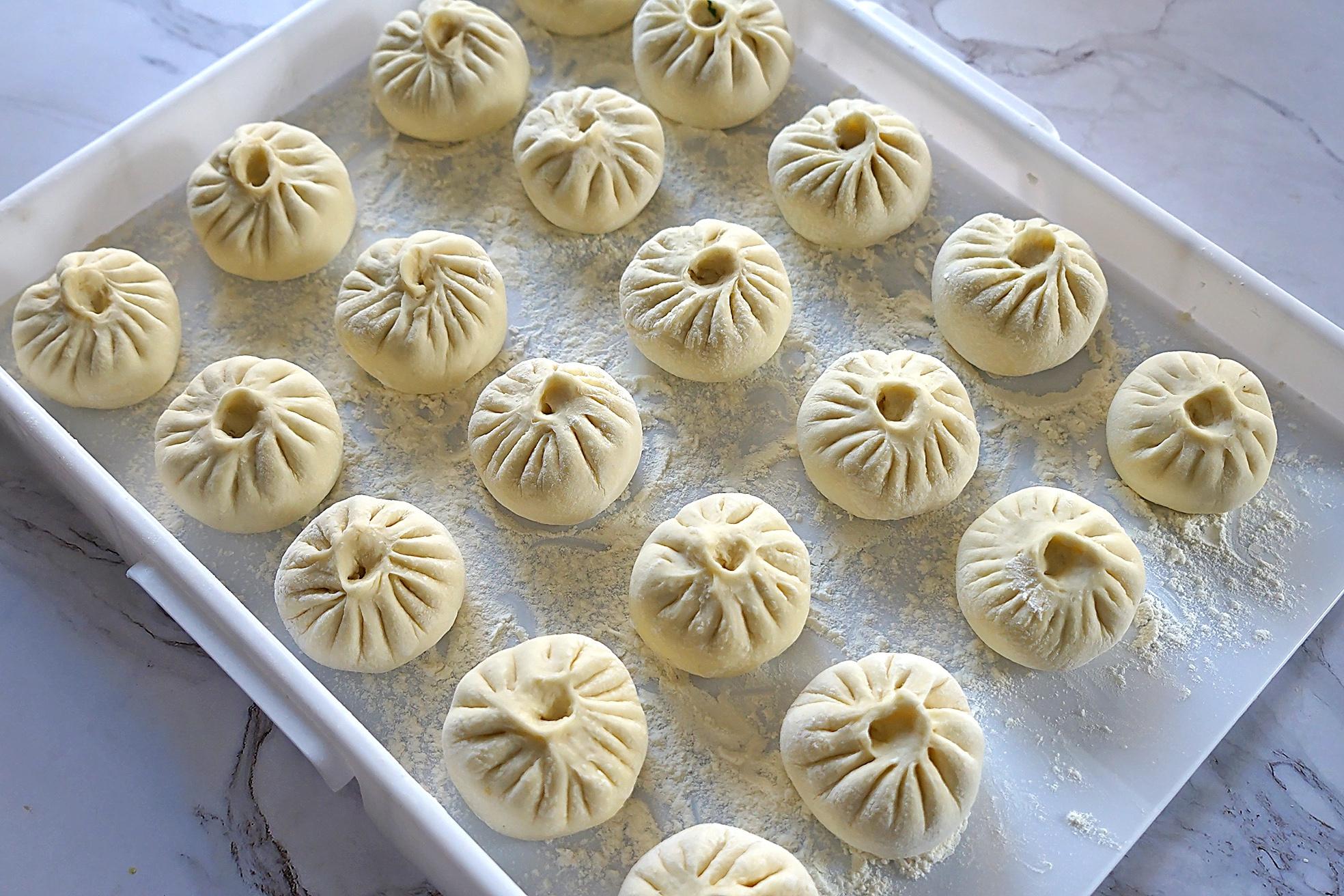 婆婆没想到儿媳第一次包包子,就比她包了几十年的还漂亮