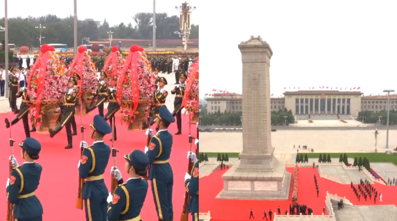 向人民英雄纪念碑敬献花篮 礼兵抬花篮缓行目光坚毅 稳稳放在纪念碑前