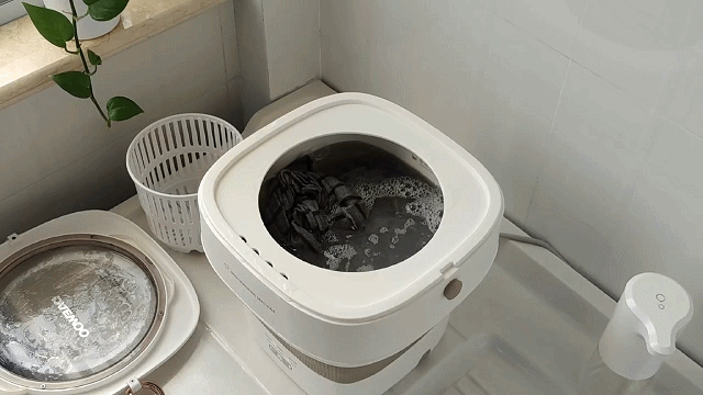 你痛恨洗袜子吗?试试大宇迷你折叠洗衣机_新浪众测