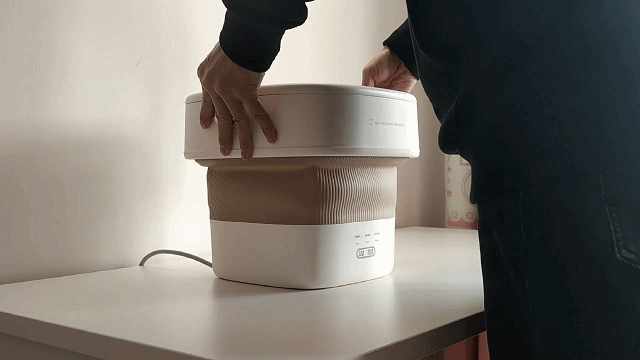 你痛恨洗袜子吗?试试大宇迷你折叠洗衣机_新浪众测