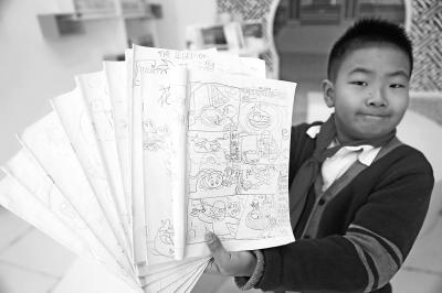 10岁的许央修去年开始画漫画，到今年已经画出两部漫画书。