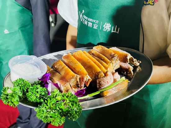 “太公分猪肉”成为百家宴中特色环节