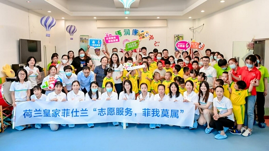 图：菲仕兰联合北京爱心语润智力残疾人康复中心组织北京志愿者活动