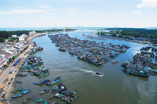 万宁港北港:日落耕海清晨归